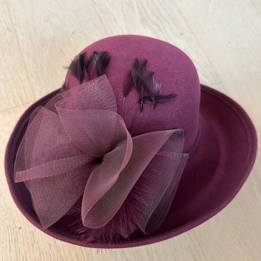 Elegant Plum Hat with Feather and Bow Detail